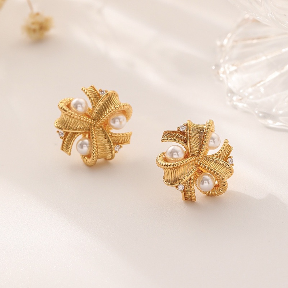 Elegant Gold and Pearl Bow Earrings